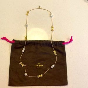 Kate Spade pearls and gold bows